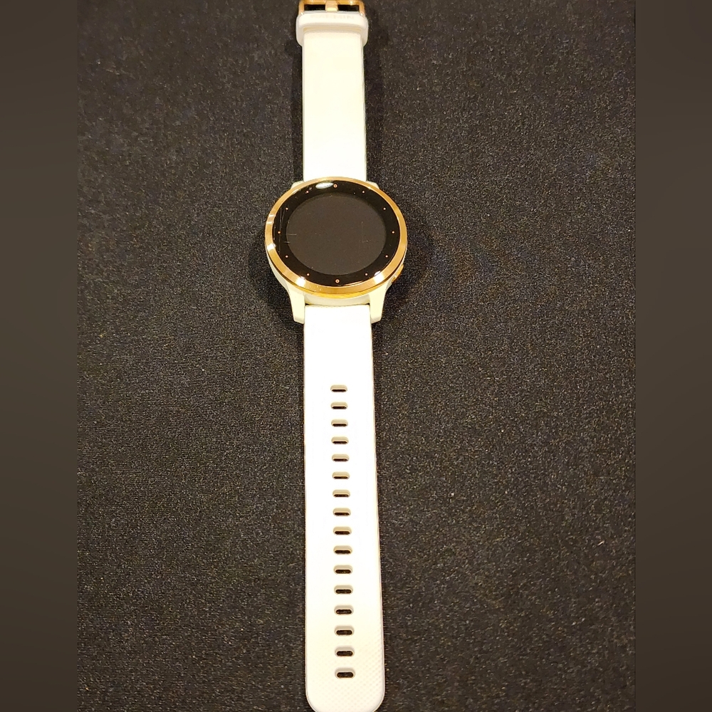Garmin white 4S watch